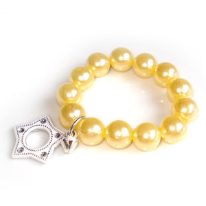 Pearl in cream colour with white star children bracelet