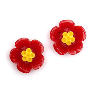 Red plum blossom flower with gold-tone clip earrings