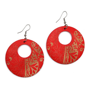 Red engraved round wood dangle earrings with tribal motif