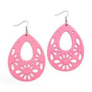 Pink teardrop wooden dangle earrings with flower cut out design