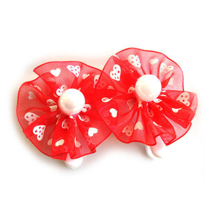Pair of red textured bow hair clips