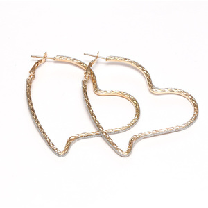 Gold tone open heart with silver glitter hoop earrings