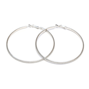 Silver tone hoop earrings with silver glitter