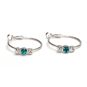 Blue zircon crystal rhodium plated hoop earrings