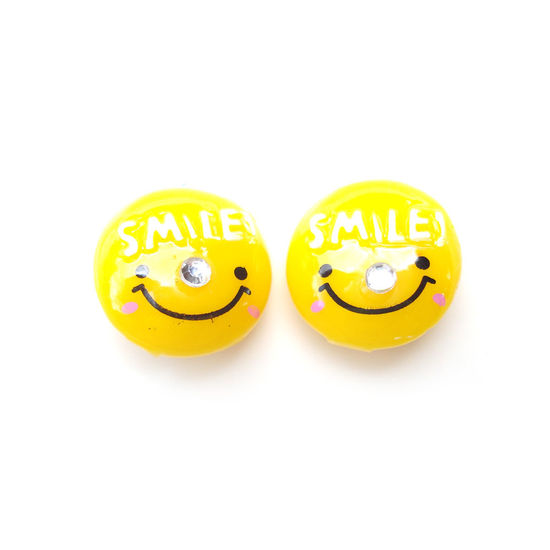 Round, yellow "SMILE" Clip-ons