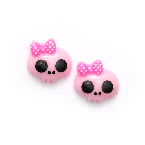 Light pink baby doll skull with bow clip-on earrings