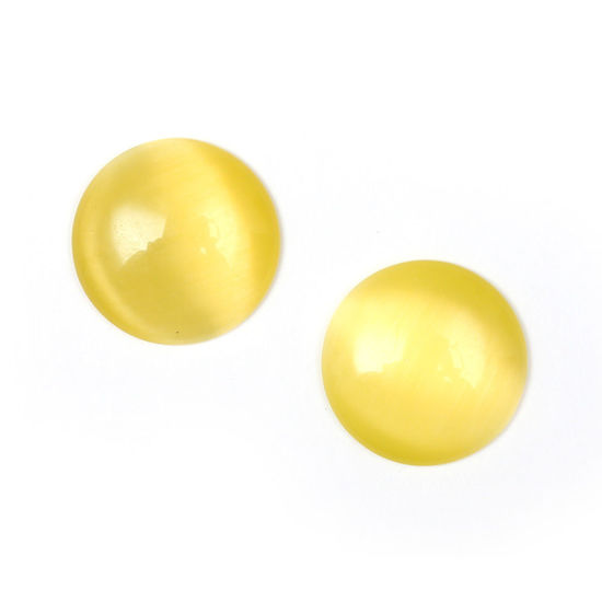 Yellow glass with cat eye effect flat back round