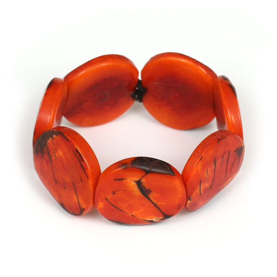 Handmade orange Tagua (vegetable ivory) disc elasticated bracelet