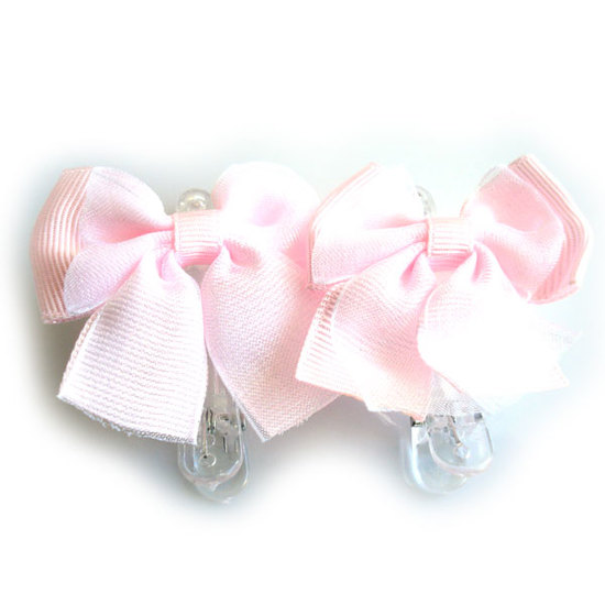 Pair of pink textured bow hair clips