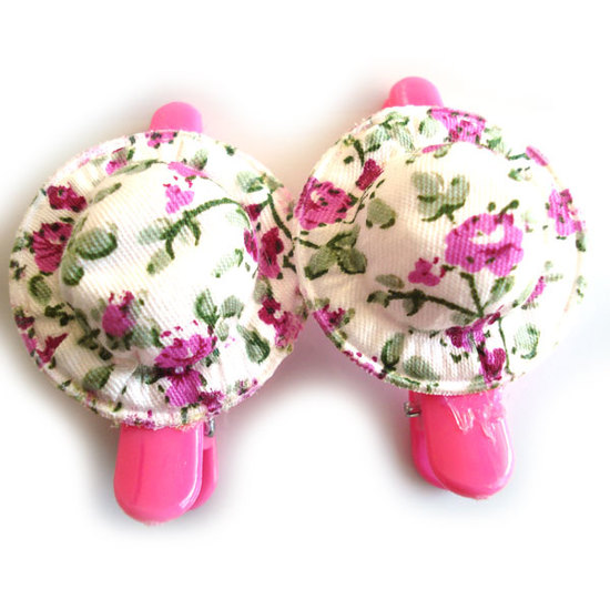 Pair of green and pink floral bonnet hair clips