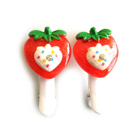 Pair of red and white strawberry hair clips
