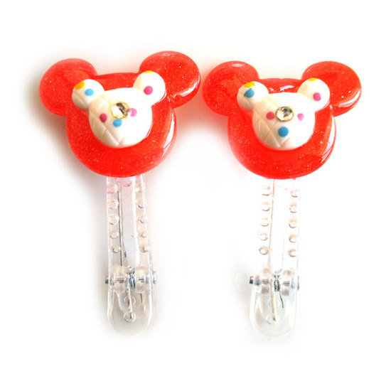 Red and white Mickey Mouse-shaped hair clips