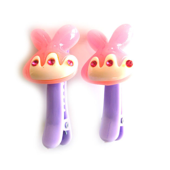 Pink and white bunny-shaped hair clips
