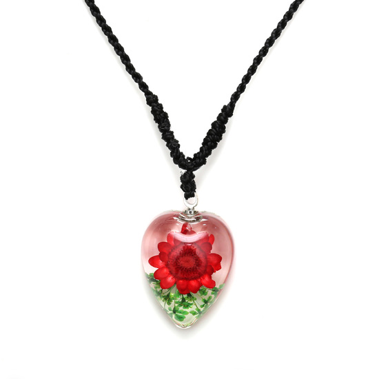 Red pressed flower in clear resin heart pendant...