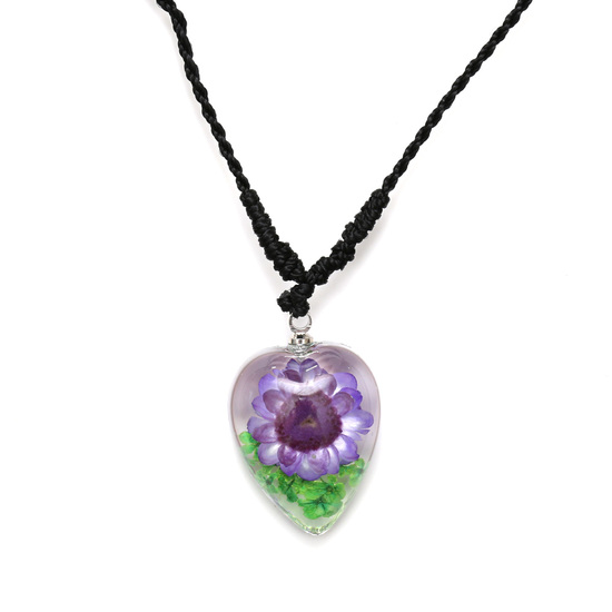 Purple pressed flower in clear resin heart pendant...