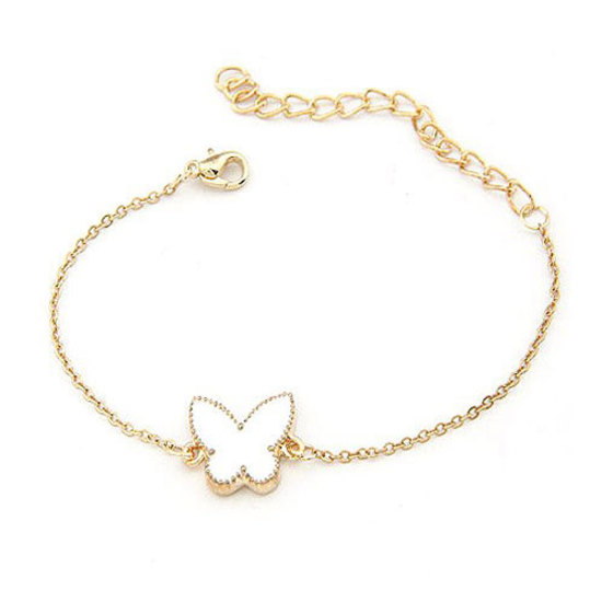 Gold tone bracelet with white enamel butterfly...