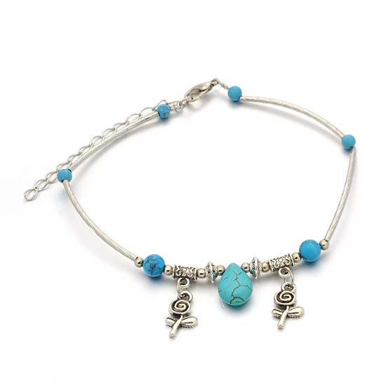 Antique silver-tone tube bead anklet with synthetic turquoise and flower charms
