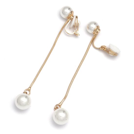 White faux pearl with dangling gold-tone chain...
